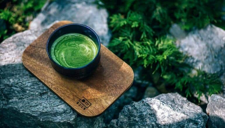 matcha green tea on wooden board