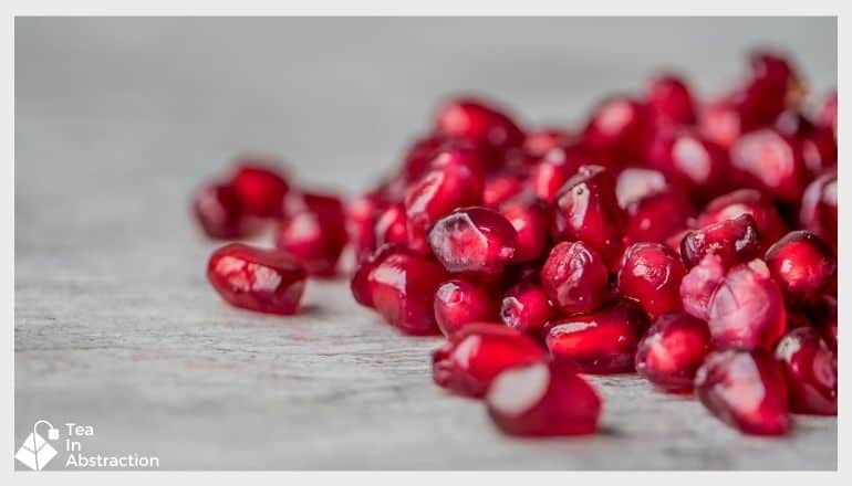 pomegranates seeds on a table