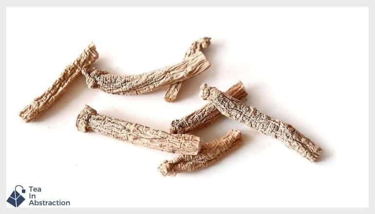 dried ginseng root against a white background