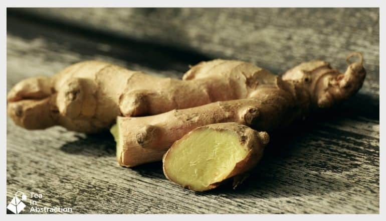 fresh cut ginger root on a wood table