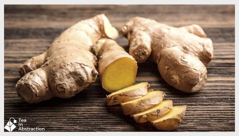 sliced ginger root on a wood table